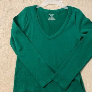 Green tight, long sleeve shirt